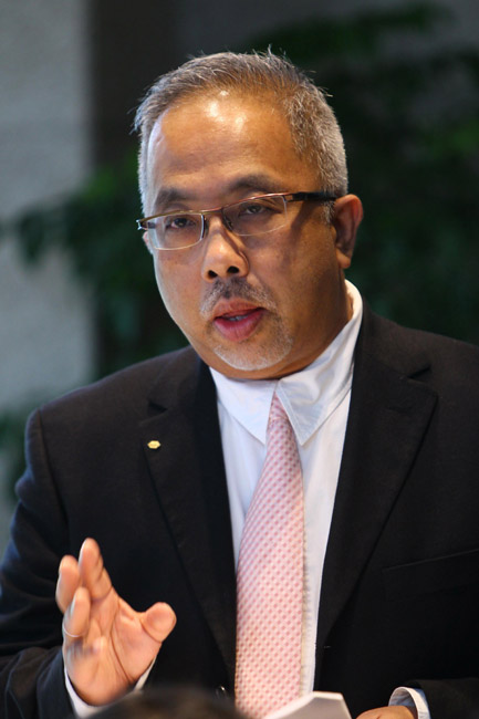 罗氏诊断黄柏兴先生荣获2013年度白玉兰荣誉