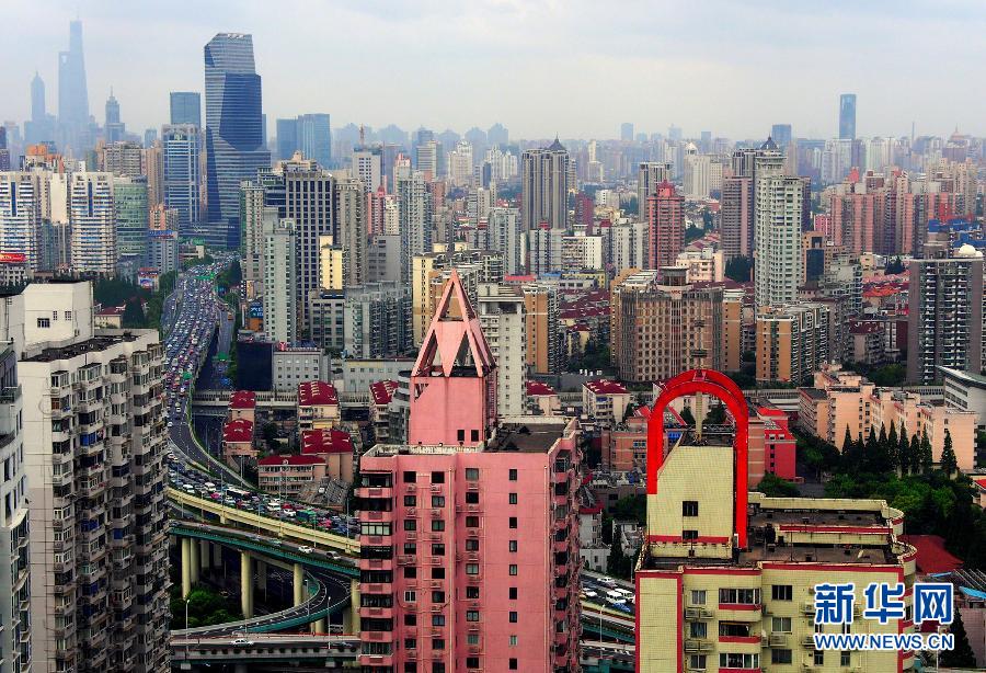 上半年上海房地产市场呈现量跌价缓态势